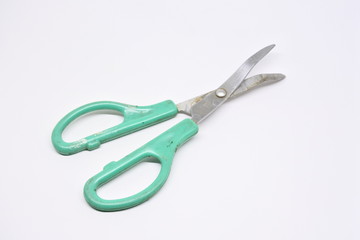 crooked scissors on white background
