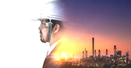 Double exposure of Refinery industry engineer with safety helmet and abstract background for copy space.