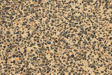 Exposed aggregate concrete background pattern, concrete with pebbles surface, rough grunge texture.