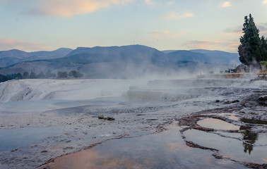 sunrise in the fog  in winter landscape in pamukkale