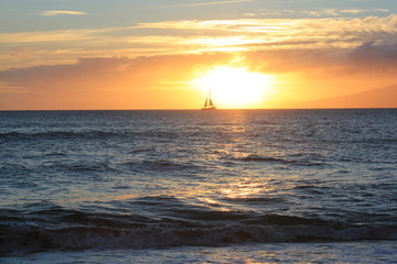 Fototapeta na wymiar Sailboat at Sunset