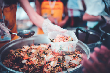 Charity food, Food for the poor hungry volunteers offering food to help the homeless : Concept of getting help from fellow humans