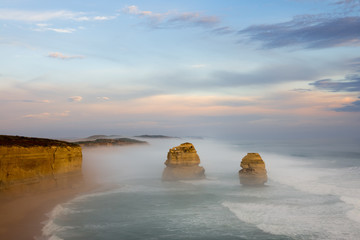 Gibsons Beach and 12 Apostles surrounded by mist - obrazy, fototapety, plakaty
