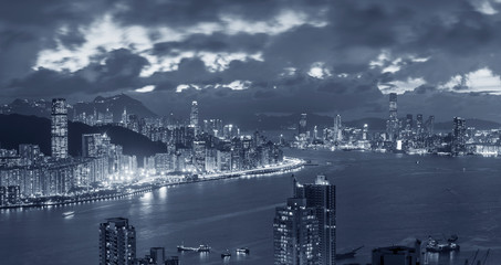 Fototapeta premium Panorama view of Victoria Harbor of Hong Kong city at night