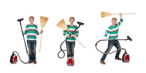 Fototapeta na wymiar Man with vacuum cleaner and broom on white