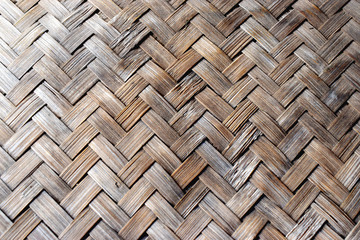 Gray color of old bamboo basketry pattern. Woven bamboo background