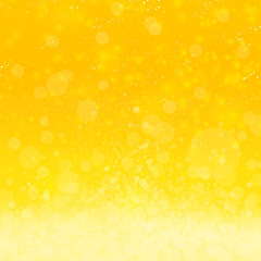 キラキラ黄色に輝く抽象的な背景 光が舞い踊るぼかし質感 柔らかい黄色系暖色グラデーション