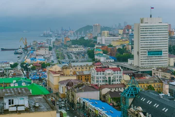 Deurstickers Central part of Vladivostok from a height. View from above. The historical center of the capital of the Far East © alexhitrov