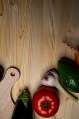 Vegetables composition on wood background