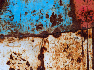 Colorful old painted steel sheets abstract background.

