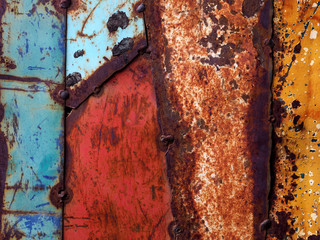 Colorful old painted steel sheets abstract background.
