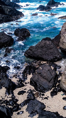rocks in the sea at Menganti beach