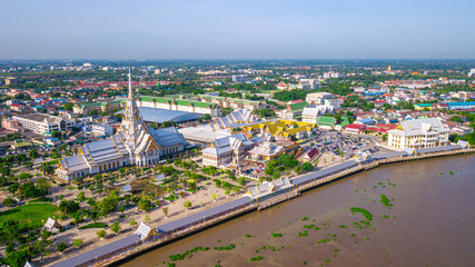 Fototapeta premium Aerial view of great grand architecture of Wat Sothon Wararam Worawihan located near Bang Pakong river in Chachoengsao province, Thailand.