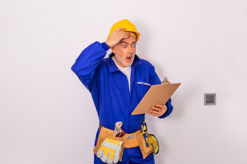 construction worker or professional man with tools and helmet