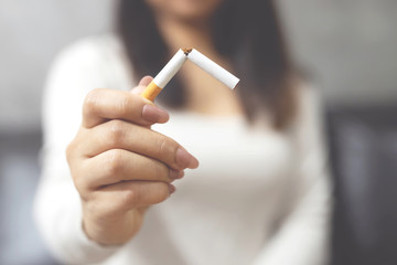 woman refusing cigarettes concept for quitting smoking and healthy lifestyle.or No smoking campaign...