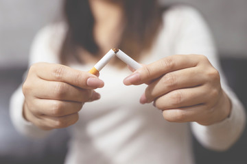 woman refusing cigarettes concept for quitting smoking and healthy lifestyle.or No smoking campaign...