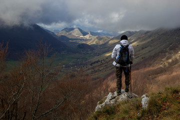 Fototapeta na wymiar hiker on the top of a mountain letino valley