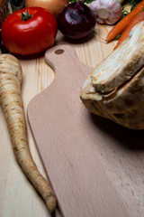 Vegetables composition on wood background