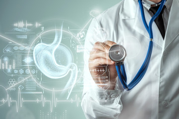Doctor against the background of a hologram of the stomach, endoscopy procedure. Digestive tract...