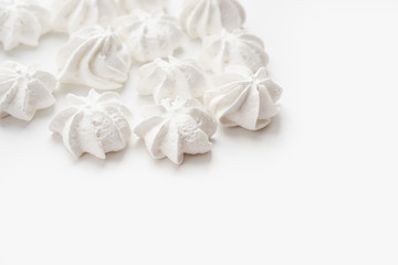 Fototapeta na wymiar meringues, meringues on a white background, confectionery