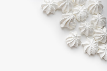 Obraz na płótnie Canvas meringues, meringues on a white background, confectionery