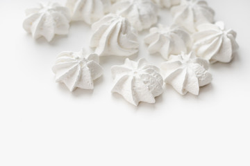 Fototapeta na wymiar meringues, meringues on a white background, confectionery