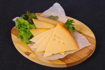 Sliced yellow Swiss cheese