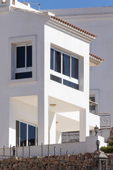 Buildings in the Middle East, Arab homes, white stucco. Against the blue sky, hot summer.