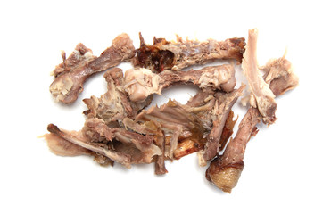 Chicken bones from food on a white background.