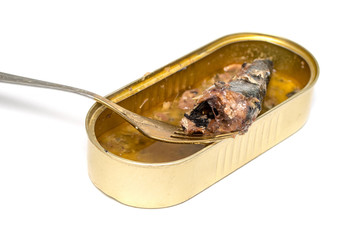 Tin can with fish in oil on a white background. Open oval jar of fish in oil, clipping path.