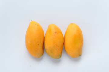 Mangoes on a white background