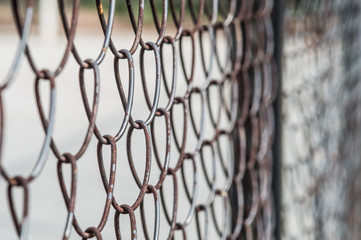 Fototapeta premium Rusty mesh closeup on the street