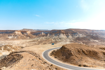 Israel Negev Desert Sede Boker. Great view of the Nakhal Tsin rift. Beautiful mountains with colorful sand. View of road in the middle of a beautiful desert. 