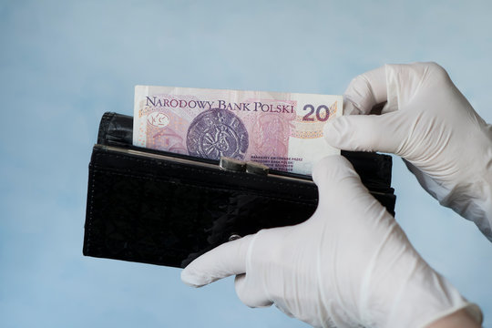 Woman Taking Money Out Female Wallet Wearing Rubber Gloves To Prevent The Spread Of Bacterias Or Viruses, Take Shopping During Coronavirus Pandemic. Microbes On Money. Refusal Of Cash.