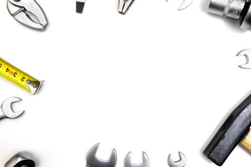 DIY tool kit in a frame on a white background with a copy of the space