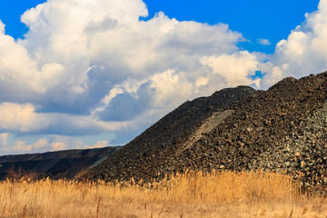View of slag heaps of iron ore quarry. Mining industry