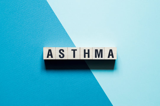 Asthma word concept on cubes