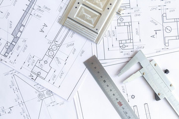 Top view of a caliper measuring tool, ruler and detail drawings.Engineering drawings, metal detail.