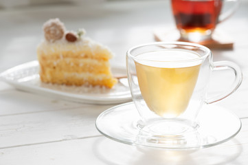 Slice Of Coconut Cake With Afternoon Tea