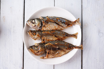 Deep fried mackerel with fish sauce, Traditional Thai food.