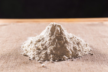 White flour on textile background texture photo