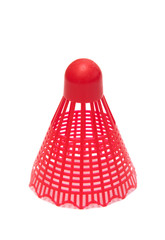 Red shuttlecock for playing badminton on a white background.