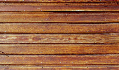 Fototapeta premium Reclaimed wood texture. Beautiful old bright orange barn wood background.