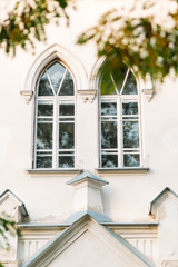 vintage windows of an old yellow castle
