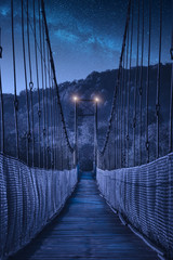 Suspension bridge in Ukraine at night