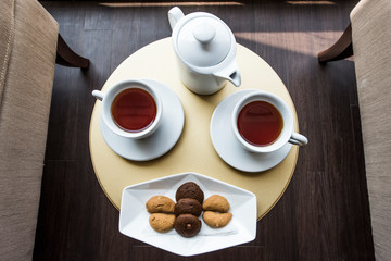 cups of tea and cookies