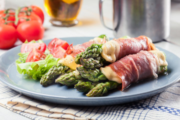 Baked prosciutto and cheese wrapped asparagus