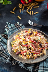Fusilli pasta salad with smoked turkey