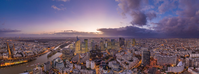 Panoramic aerial drone shot of Neuilly Levallois la defense skyscraper complex with Eiffel tower la...