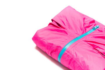 Folded pink zipper windbreaker jacket, rain proof jacket hoodie. Track jacket sport shiny nylon...
